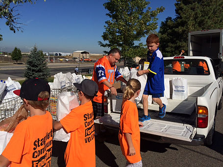 Kids helping at food drive