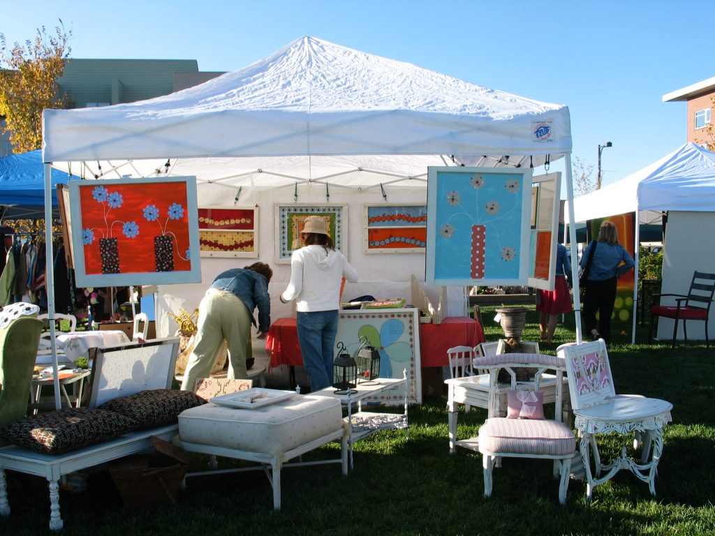 Ladies shopping art at the Sweet William Market